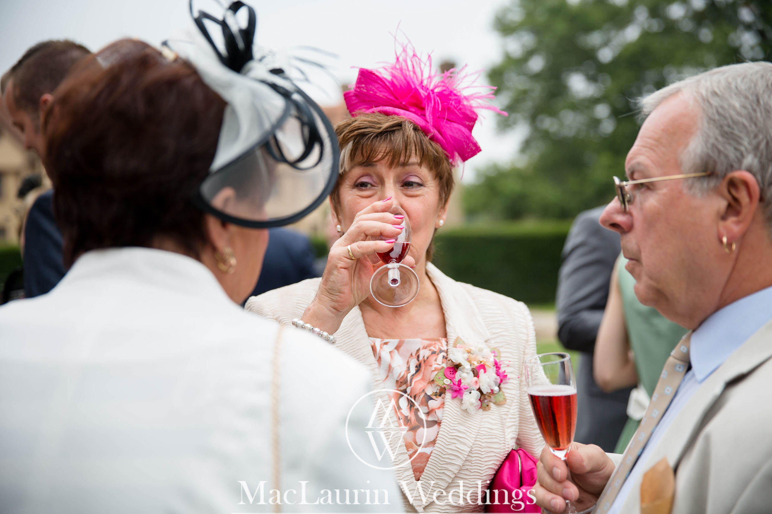 wedding hat and lovely smile, scotland wedding hat and guest with lovely smile, scotland