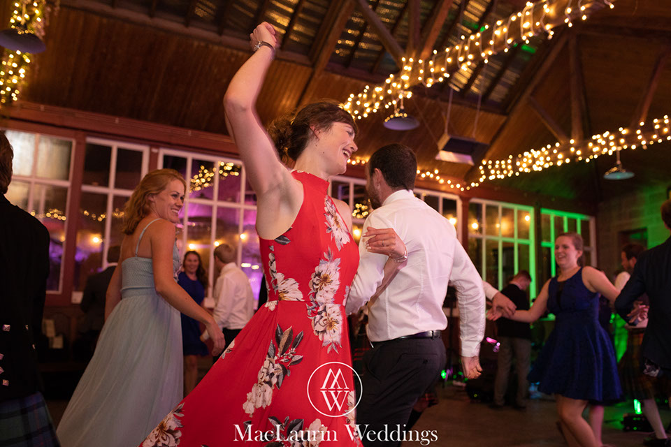 wedding hairstyling hairstylist styling hair before the wedding