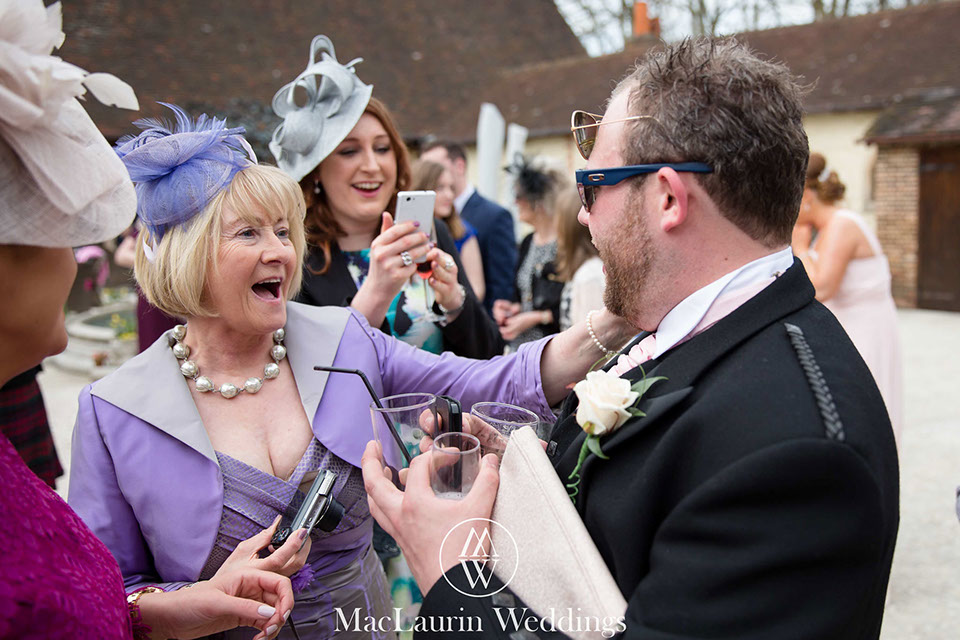 a fun wedding moment  wedding guests having a fun wedding moment