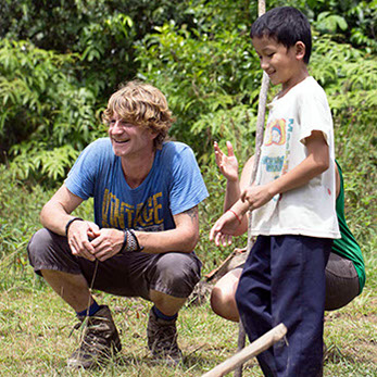 maclaurin-weddings-contact_ In borneo playing rounders with locals