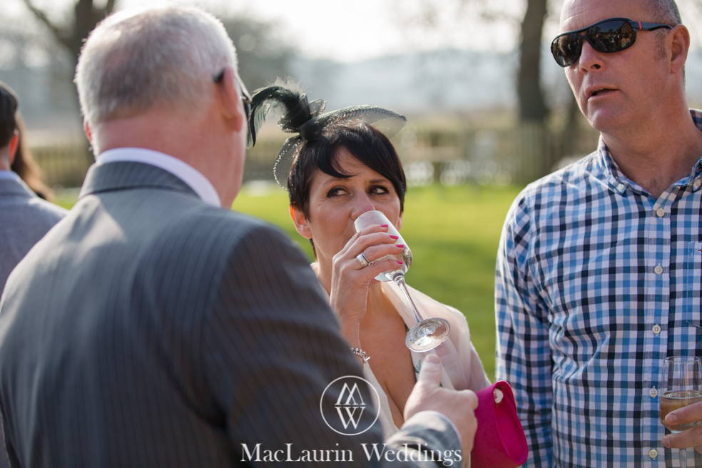 wedding hat and lovely smile, scotland wedding hat and guest with lovely smile, scotland